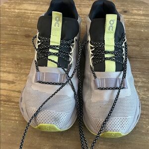 ON Running Shoes with Black and Yellow Accents